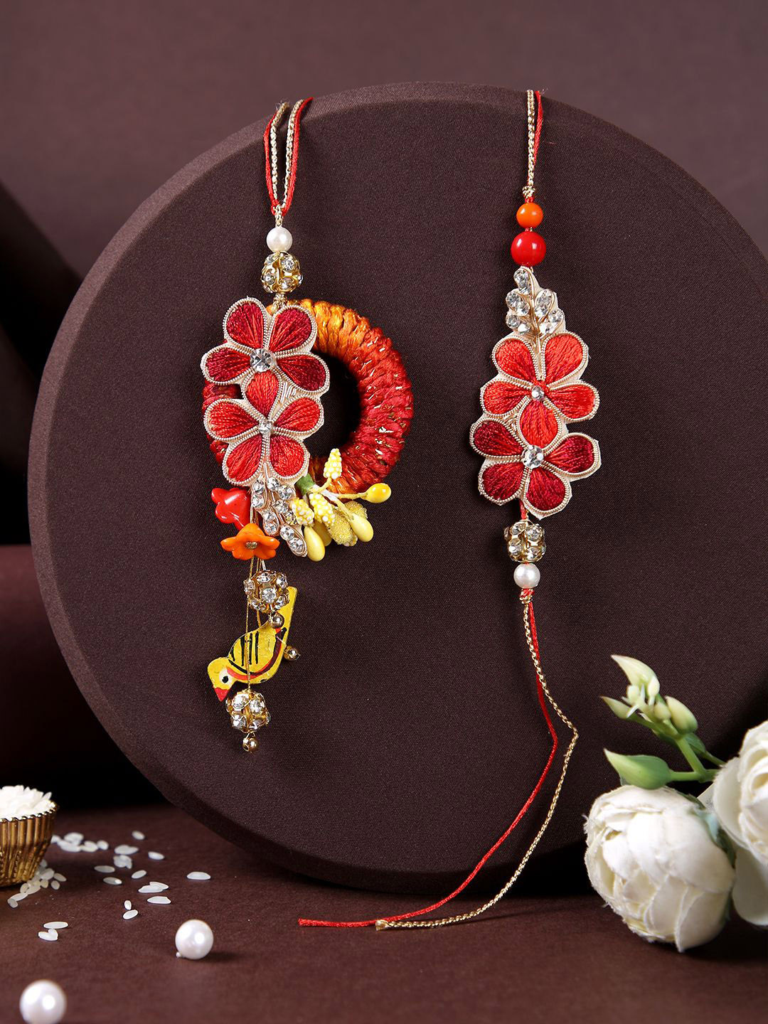 

Aapno Rajasthan Stone-Studded & Beaded Bhaiya Bhabhi Rakhi With Box, Red