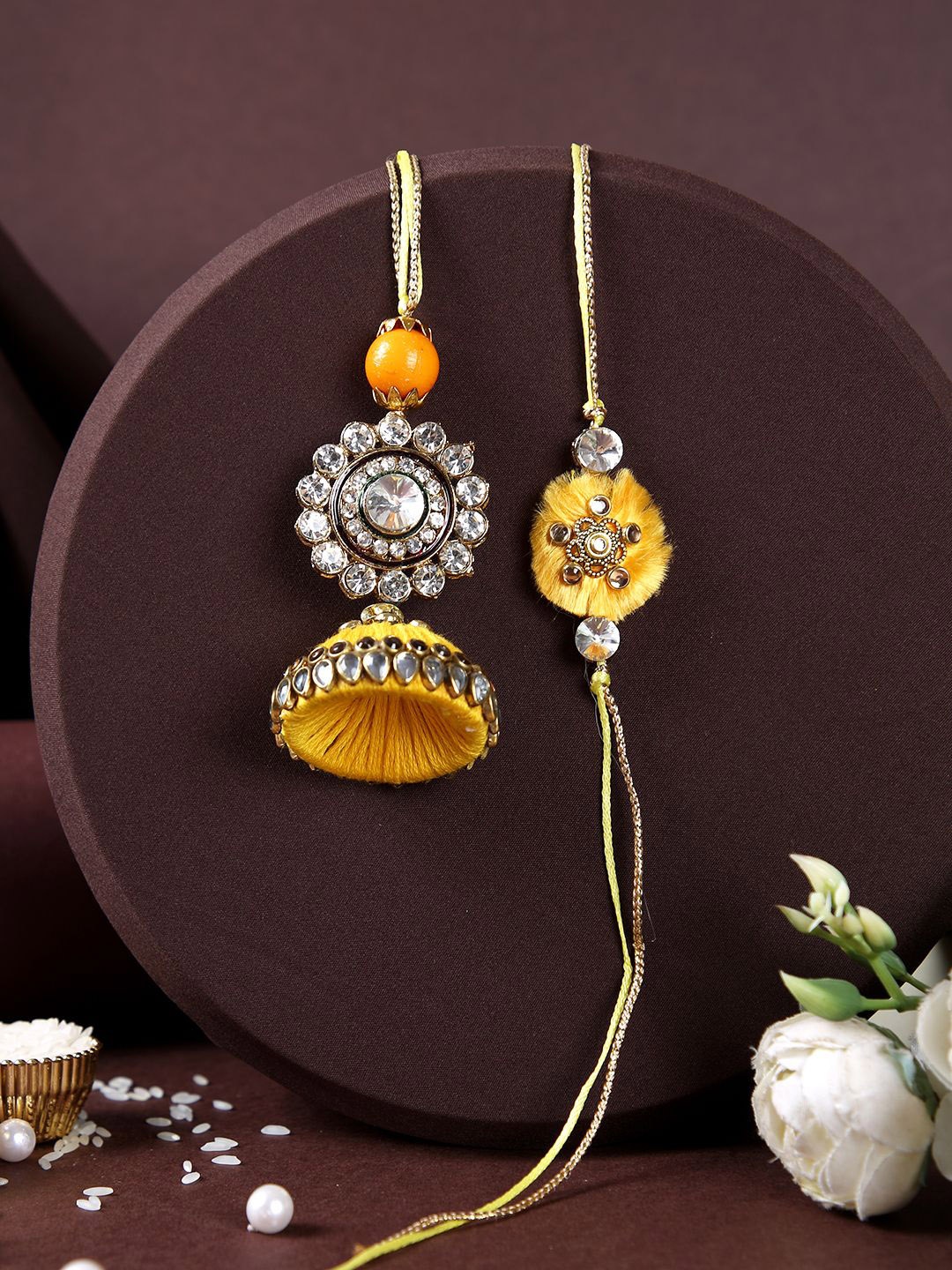 

Aapno Rajasthan Stone-Studded & Beaded Bhaiya Bhabhi Rakhi With Box, Yellow