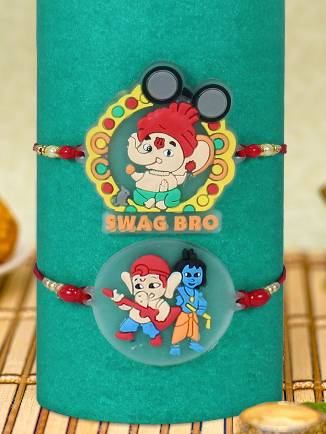 

TIED RIBBONS Boys Set of 2 Cartoon Lord Ganesha With Card And Tikka, Red