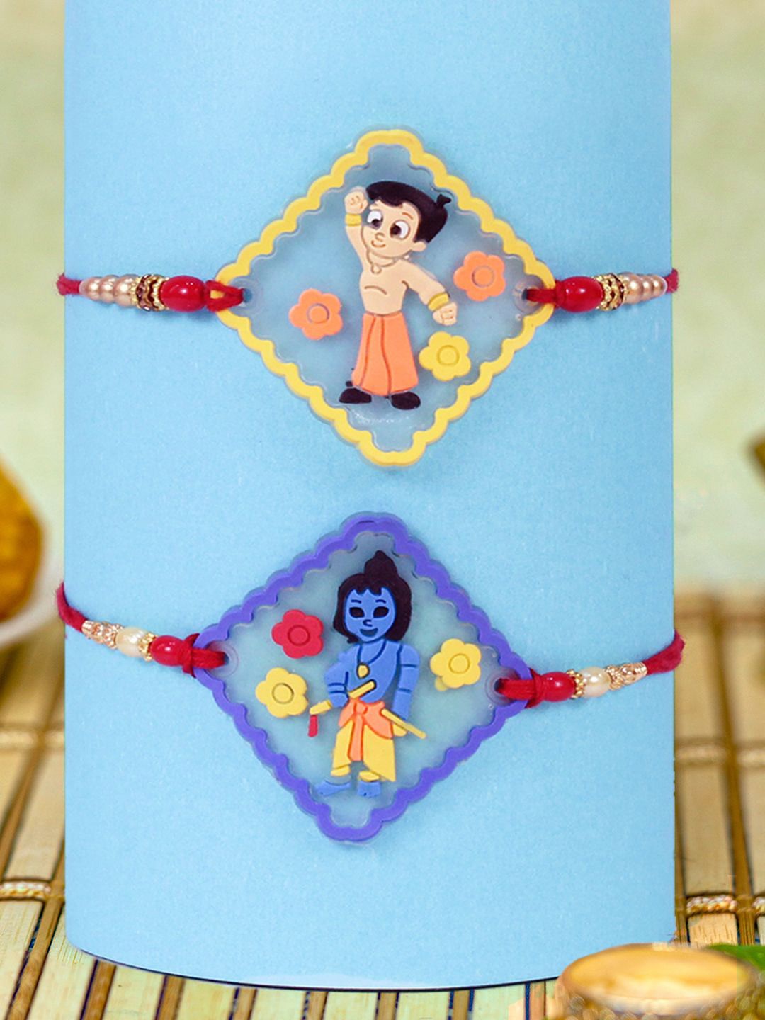 

TIED RIBBONS Set of 2 Chota Bheem & Krishna Thread Rakhis With Roli Chawal, Yellow