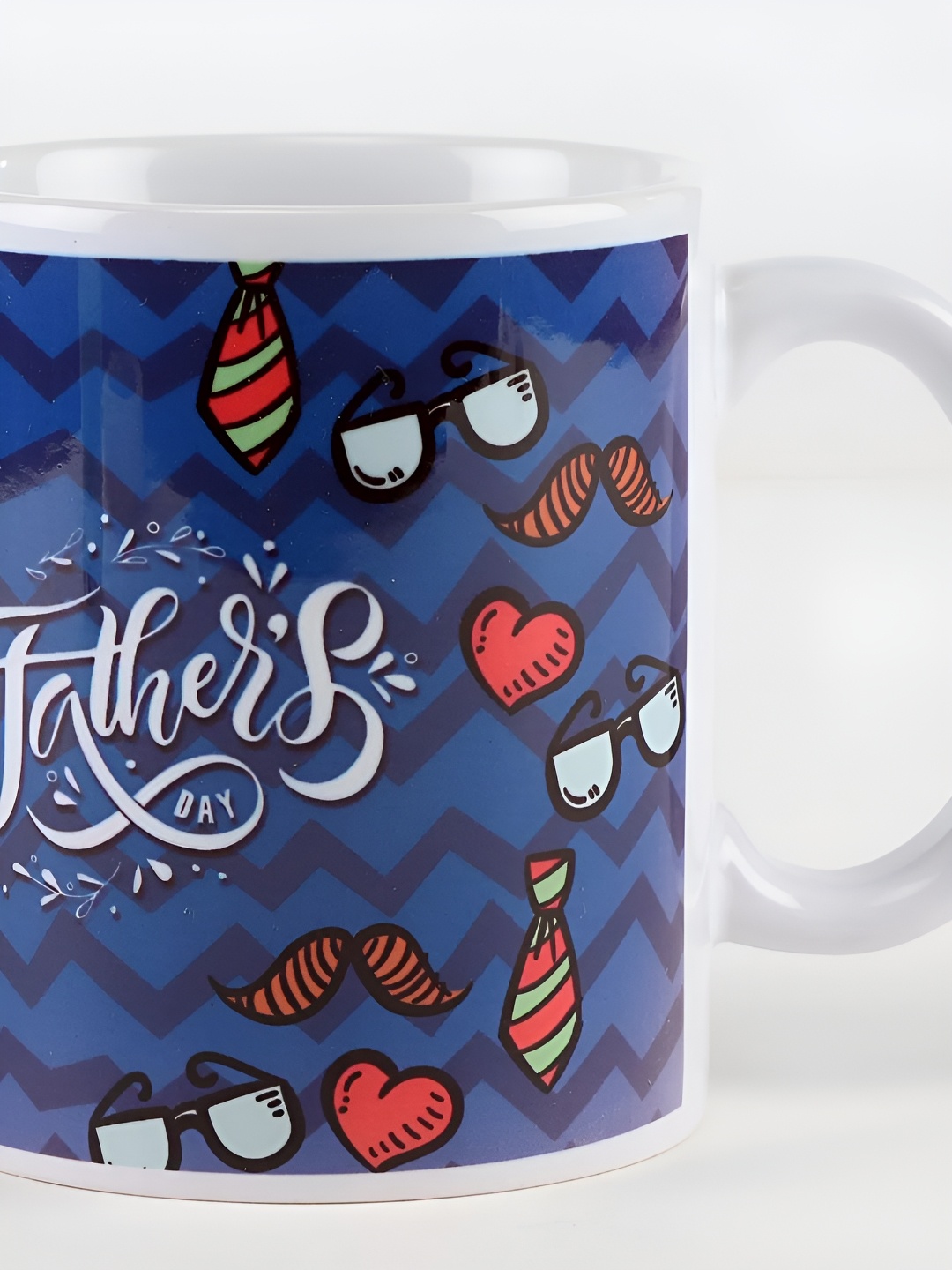 

fnp White & Blue Printed Ceramic Glossy Mug 325ml