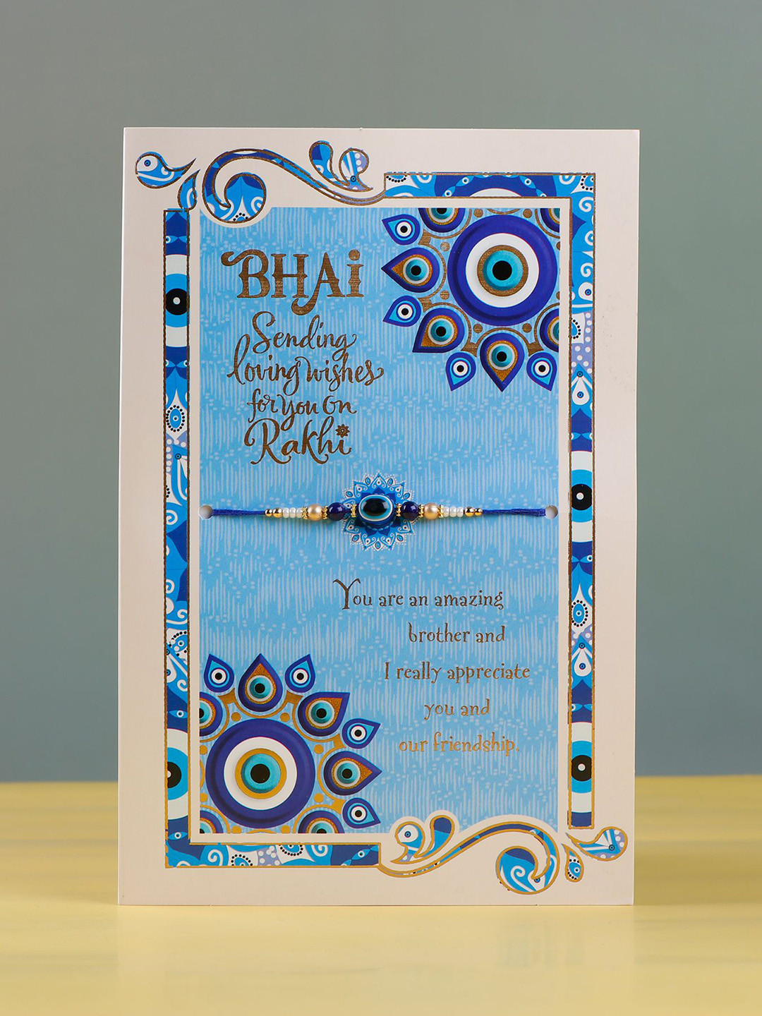 

Archies Evil Eye Beaded Rakhi With Greeting Card, Blue
