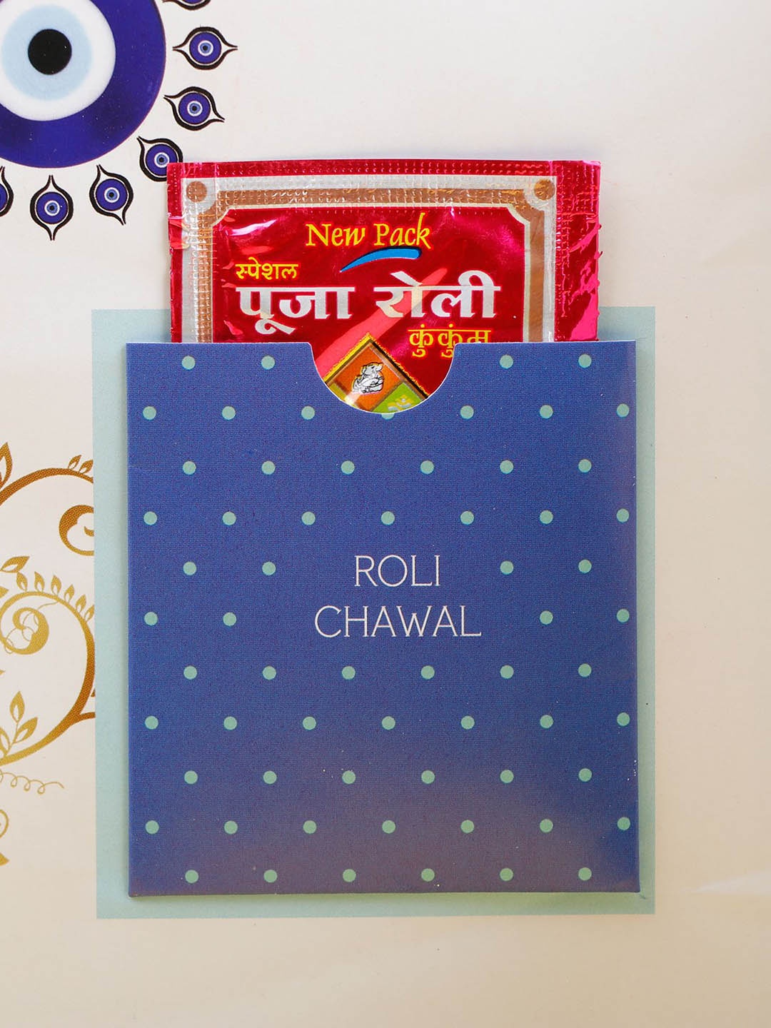 

Archies Evil Eye Beaded Rakhi With Roli Chawal And Greeting Card, Blue