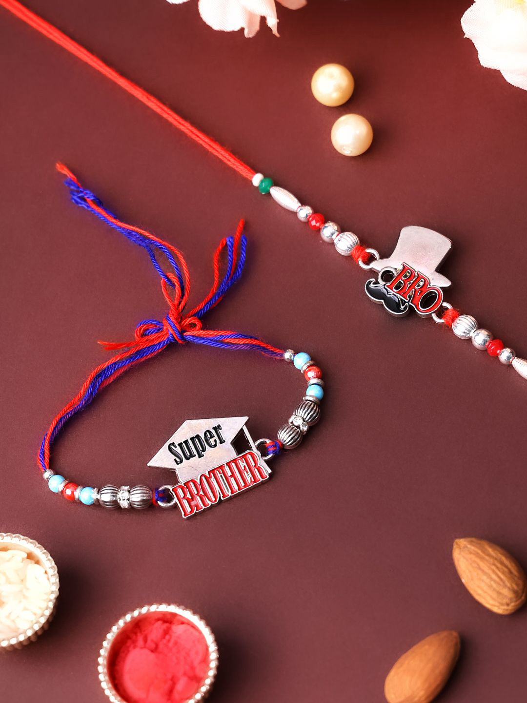 

PANASH Set Of 2 Beaded Gold Plated Thread Rakhis With Roli Chawal
