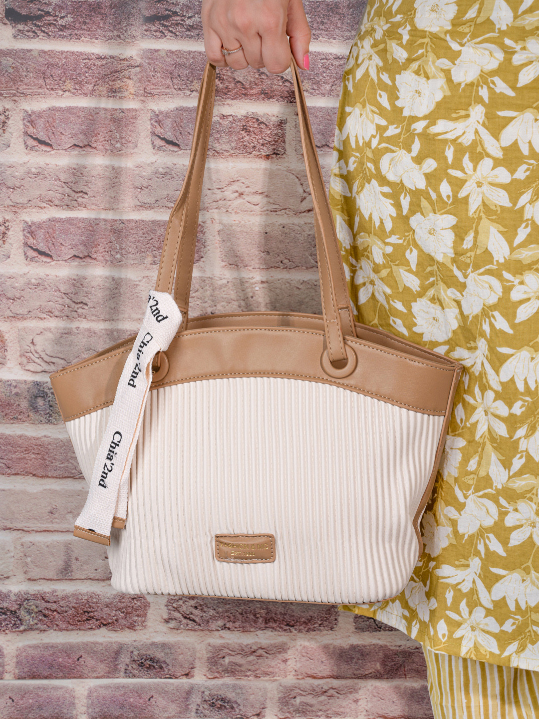 

Styli Women Beige Textured Striped Shoulder Bag