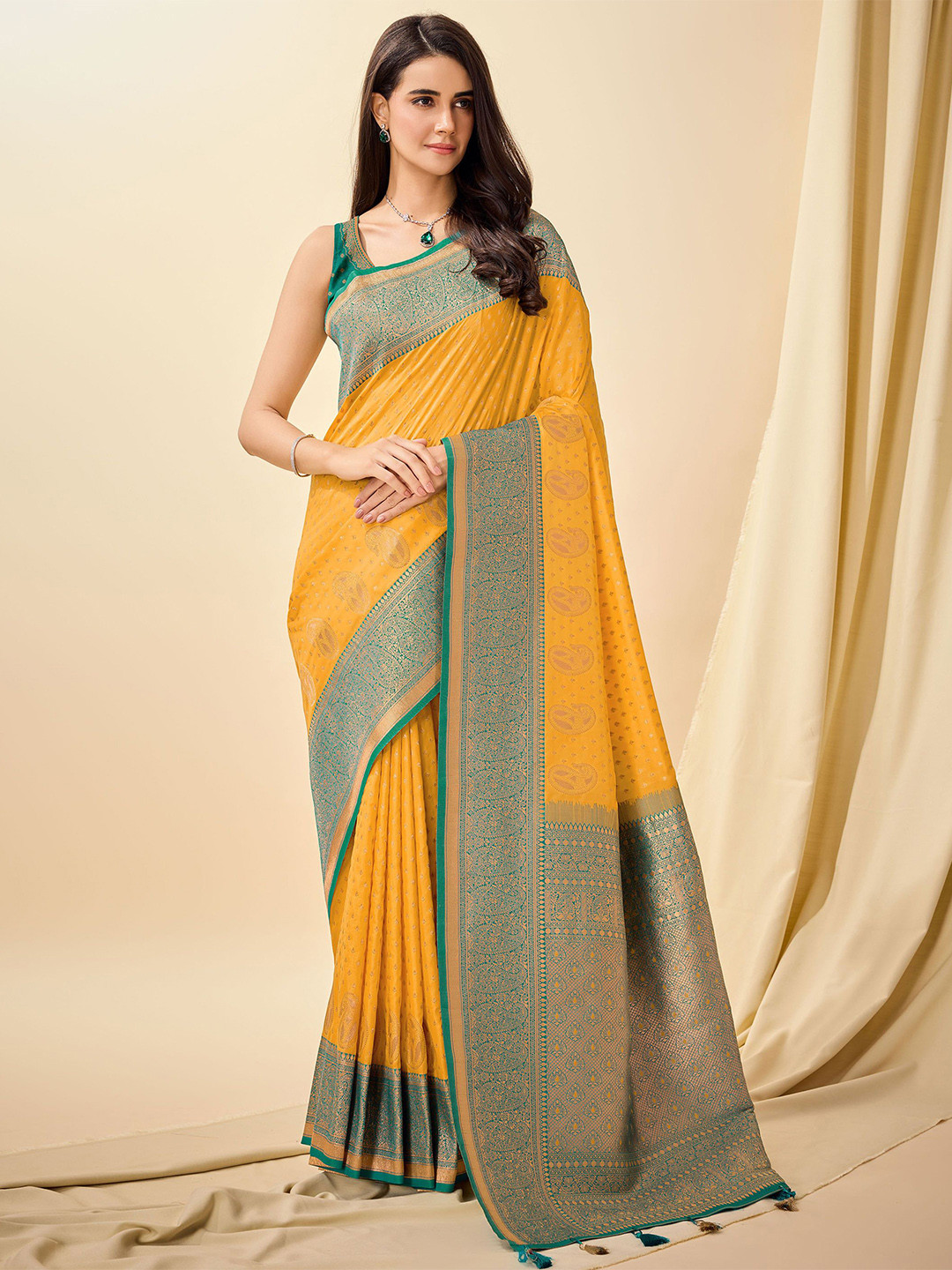 

Mitera Ethnic Motif Zari Woven Tassel Design Saree, Yellow
