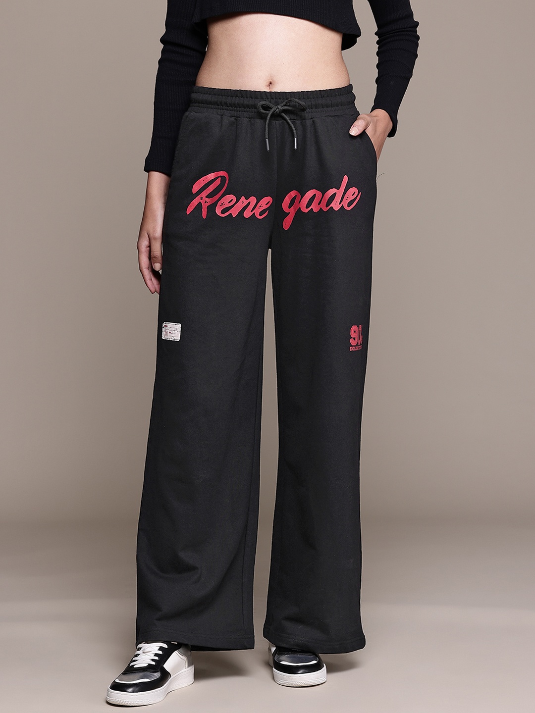 

The Roadster Lifestyle Co. Women Printed Flared Track Pants, Black