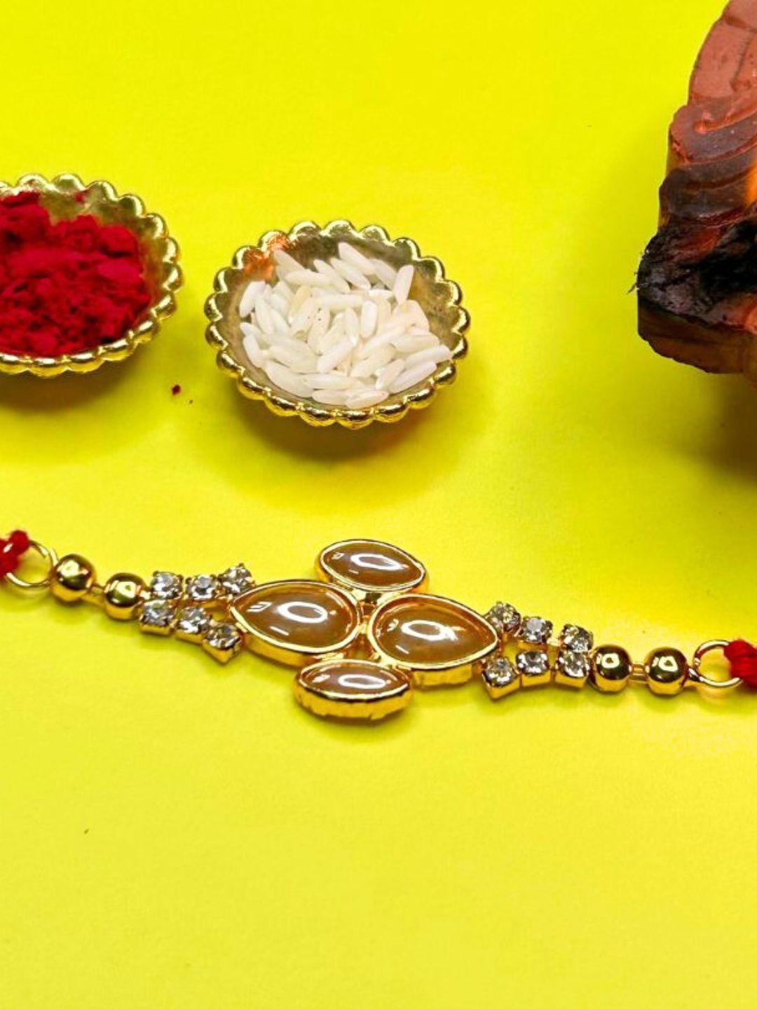 

LAIDA Stone Studded & Beaded Thread Rakhi With Roli Chawal, Gold
