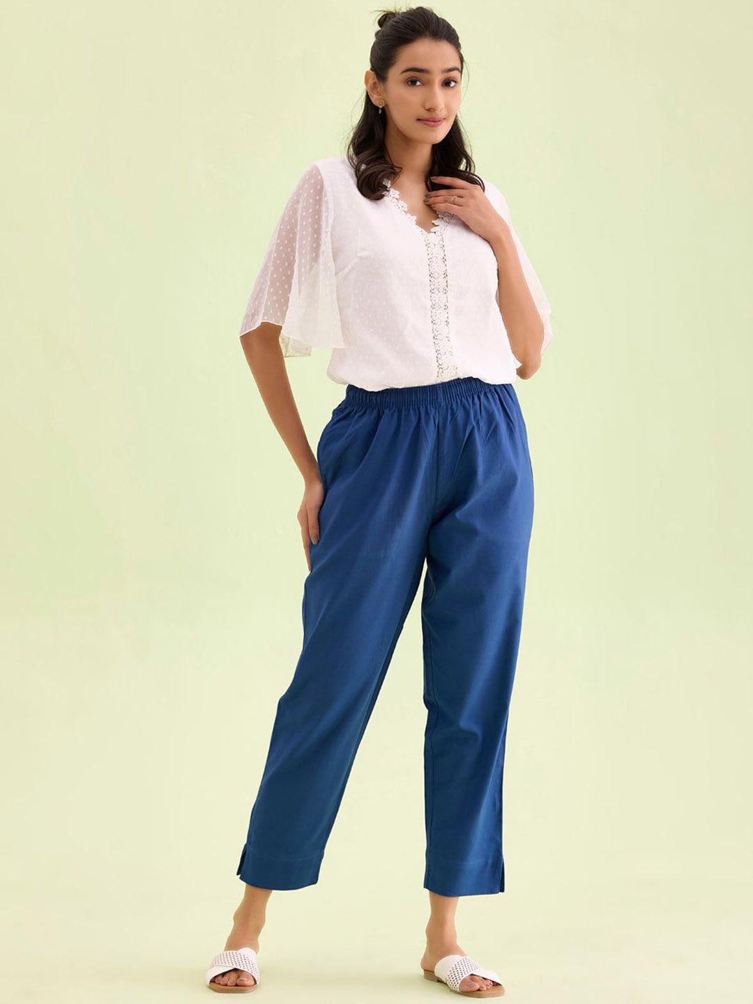 

Go Colors Women Solid Relaxed Mid Rise Loose Fit Regular Trousers, Blue