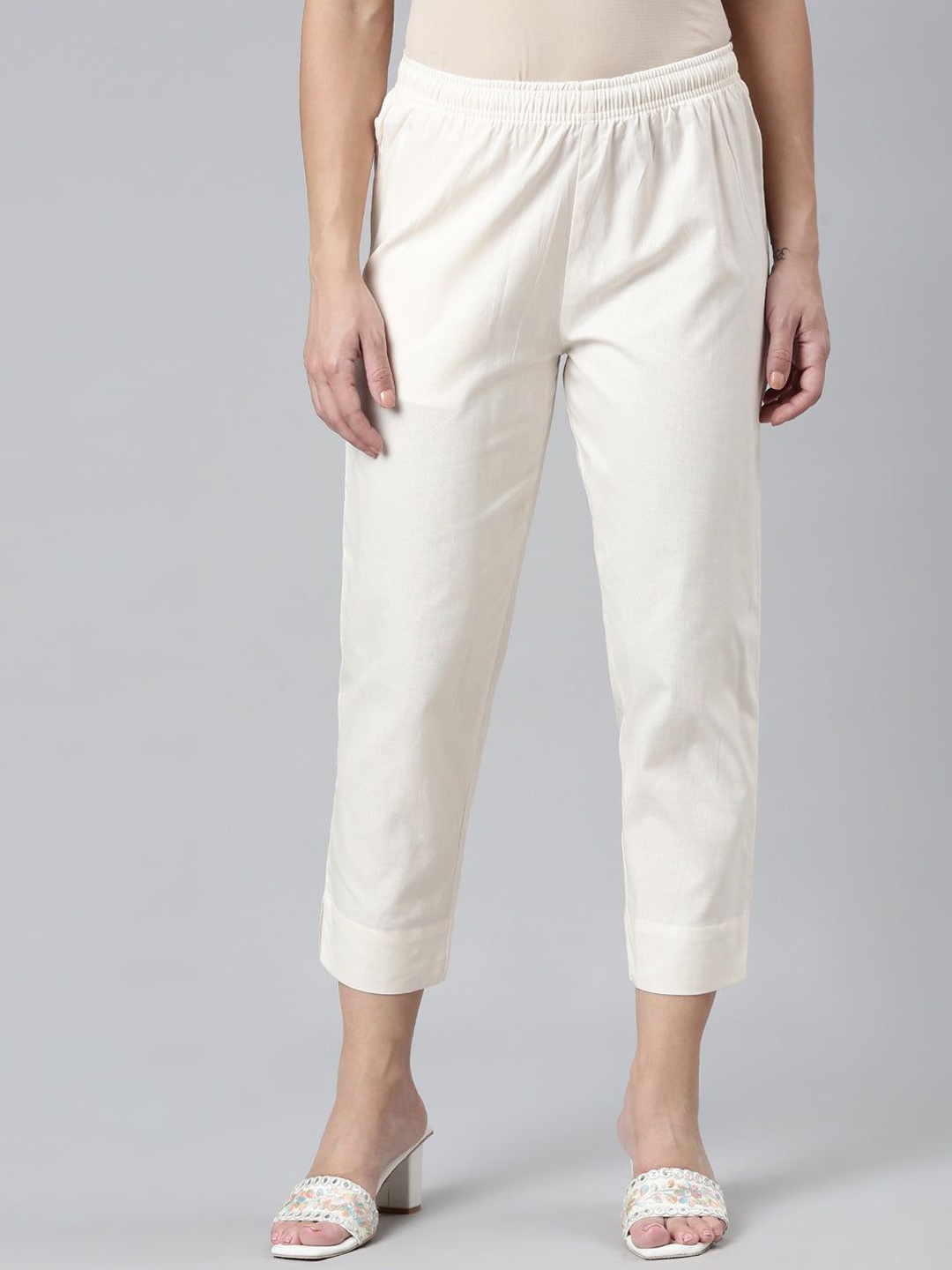 

Go Colors Women Solid Relaxed Loose Fit Mid-Rise Regular Trousers, Cream