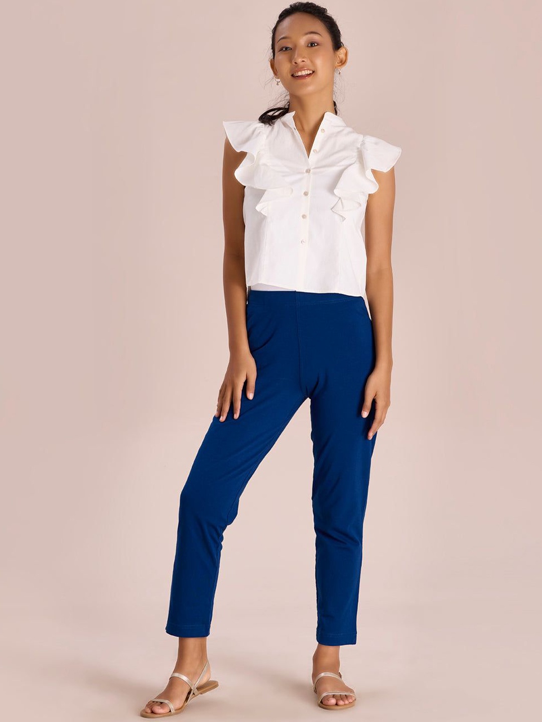 

Go Colors Women Solid Relaxed Slim Fit Mid-Rise Regular Trousers, Blue
