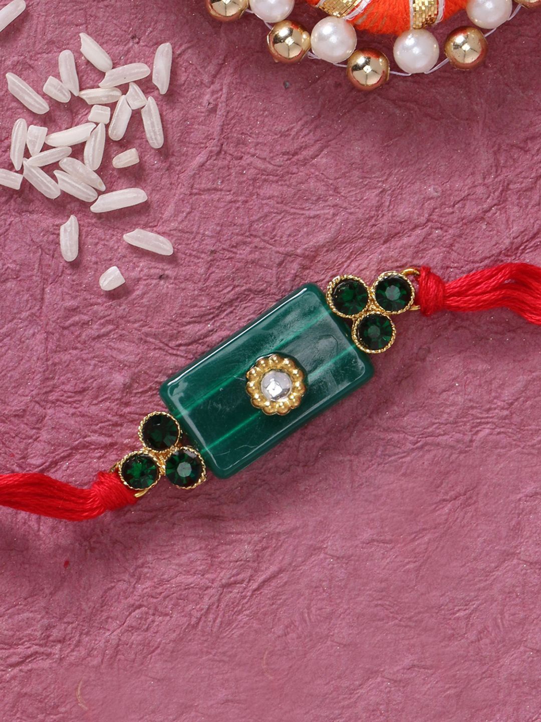

LIVE EVIL Gold-Plated Kundan Studded Thread Rakhi With Greeting Card
