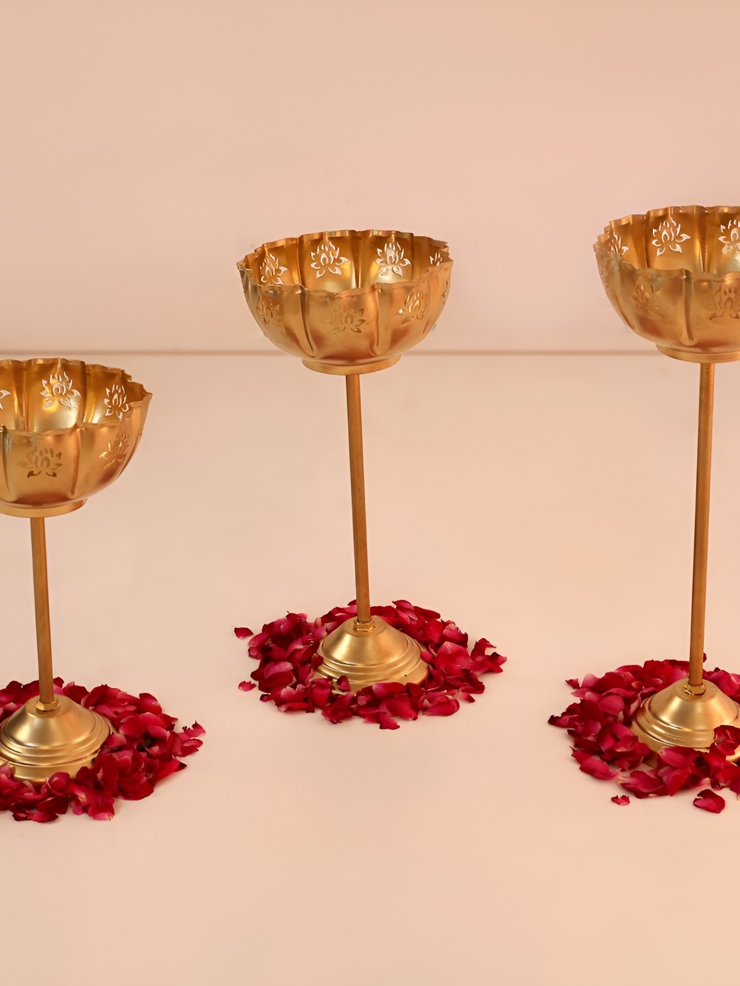 

THE HOME CO. Gold Toned 3 Pieces Aluminium Lotus Cut Stick Decorative Urli Bowl