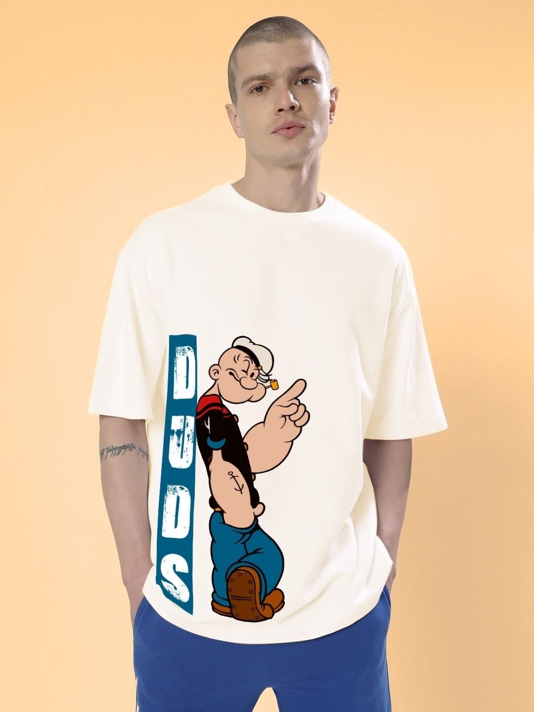 

WEARDUDS Men Graphic Printed Round Neck Cotton Oversized T-Shirt, Cream