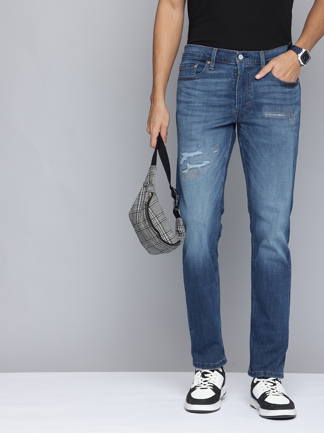 

Levis Men 511 Slim Fit Mildly Distressed Light Fade Stretchable Jeans, Blue