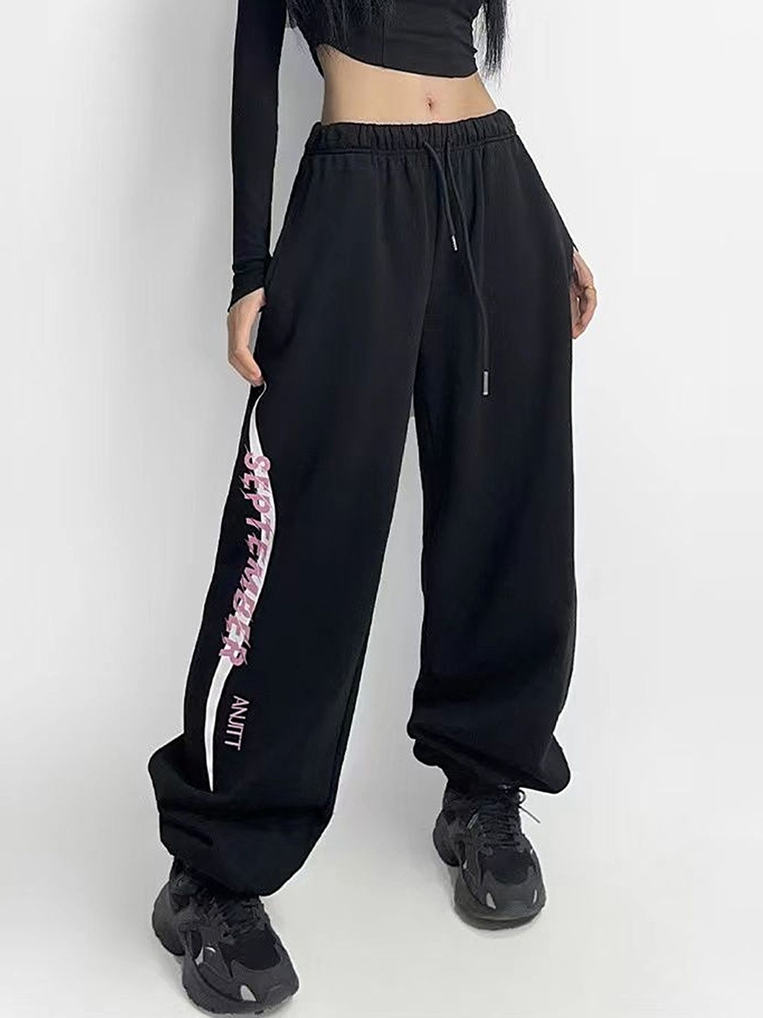 

LULU & SKY Women Printed Loose Fit MId-Rise Regular Trousers, Black