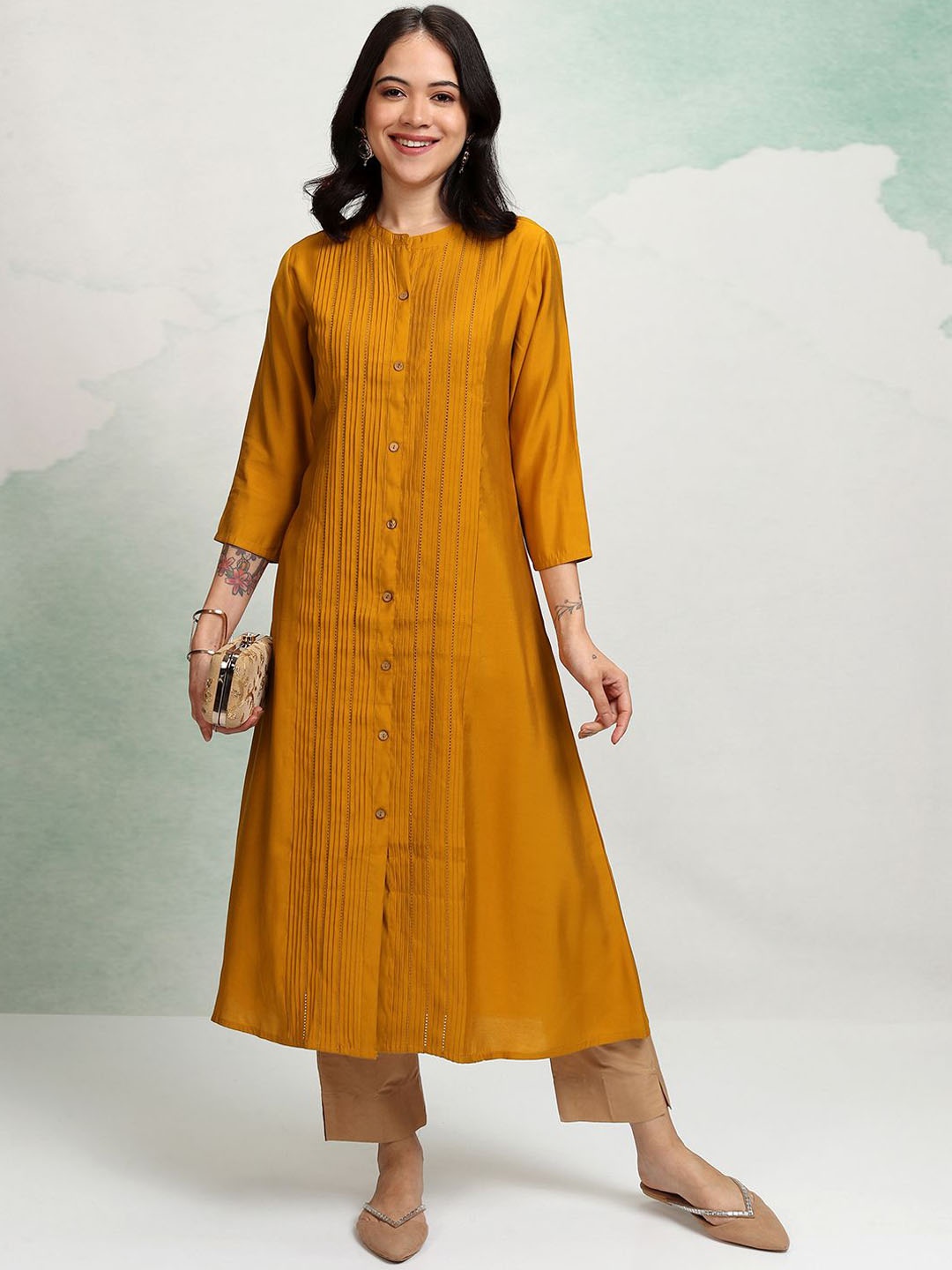 

Vishudh Mustard Yellow Striped Embroidered Thread Work Mandarin Collar A-Line Kurta