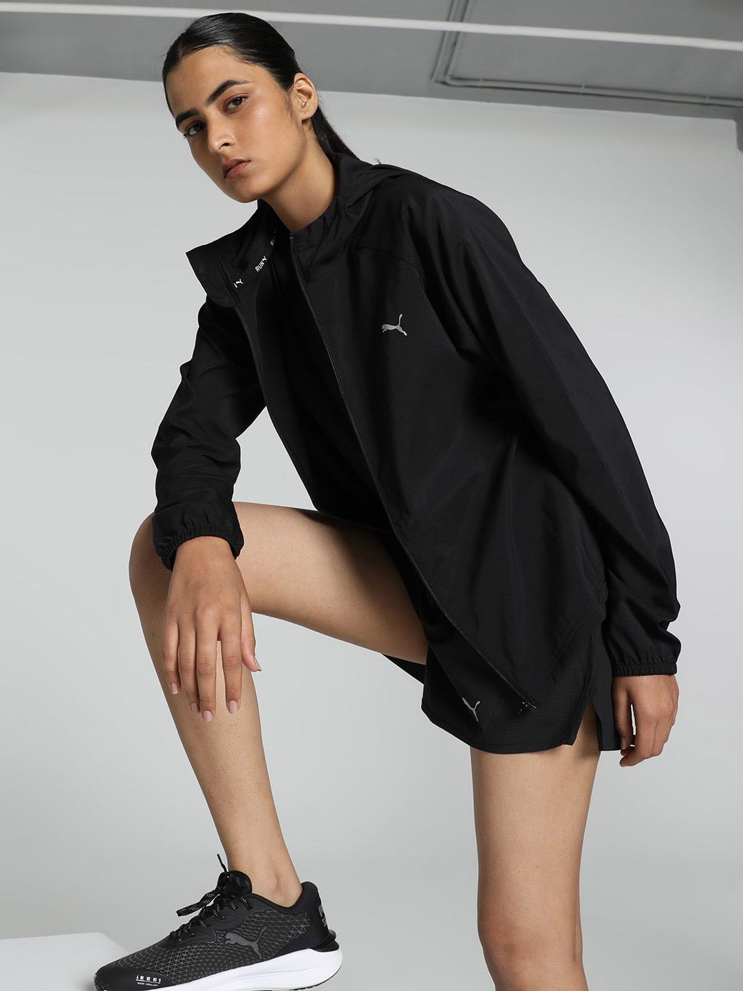 

Puma RUN FAV HOOD WOVEN Hooded Jackets, Black