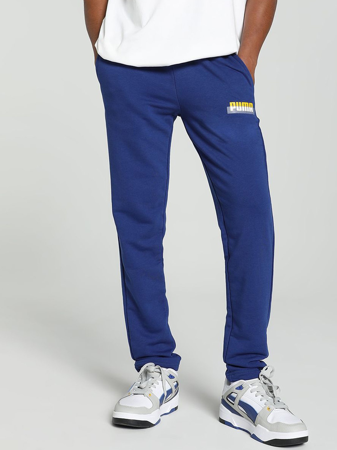 

Puma Men Solid Brand Logo Slim-Fit Mid-Rise Regular Track Pants, Blue