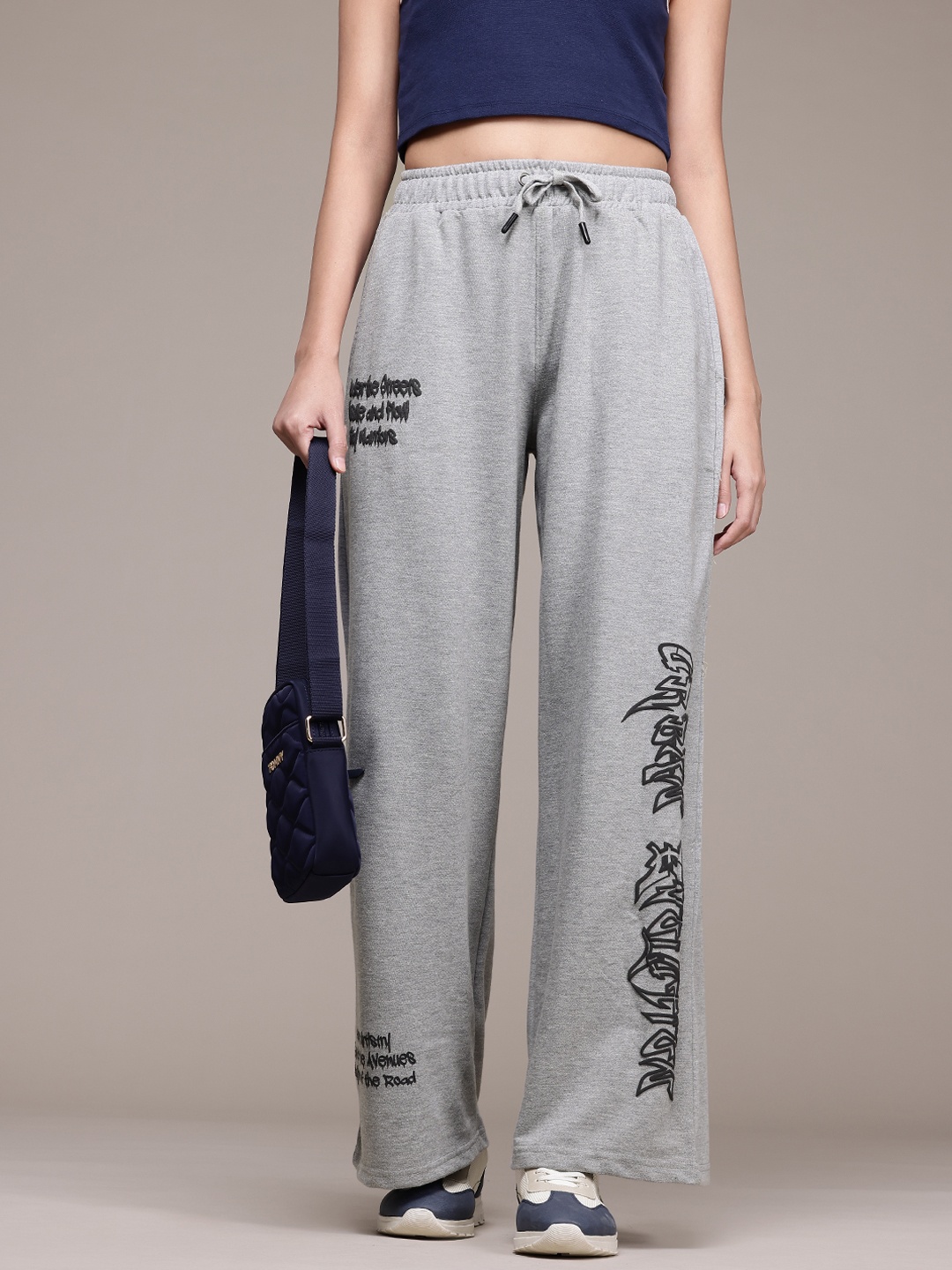 

The Roadster Lifestyle Co. Women Typography Printed Track Pants, Grey