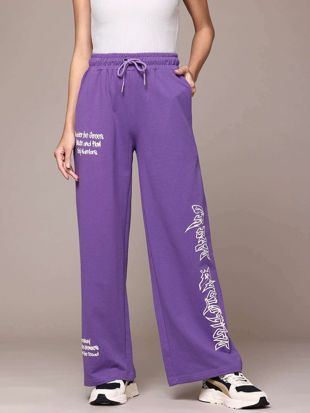 

The Roadster Lifestyle Co. Women Printed Flared Track Pants, Purple