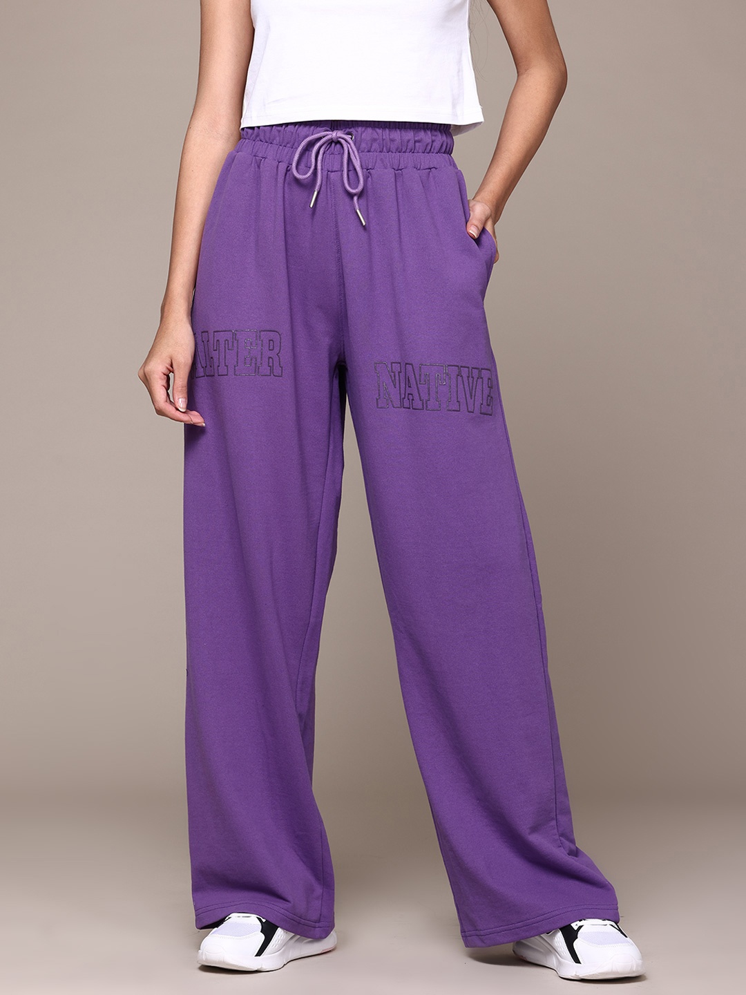 

The Roadster Lifestyle Co. Women Printed Flared Track Pants, Purple