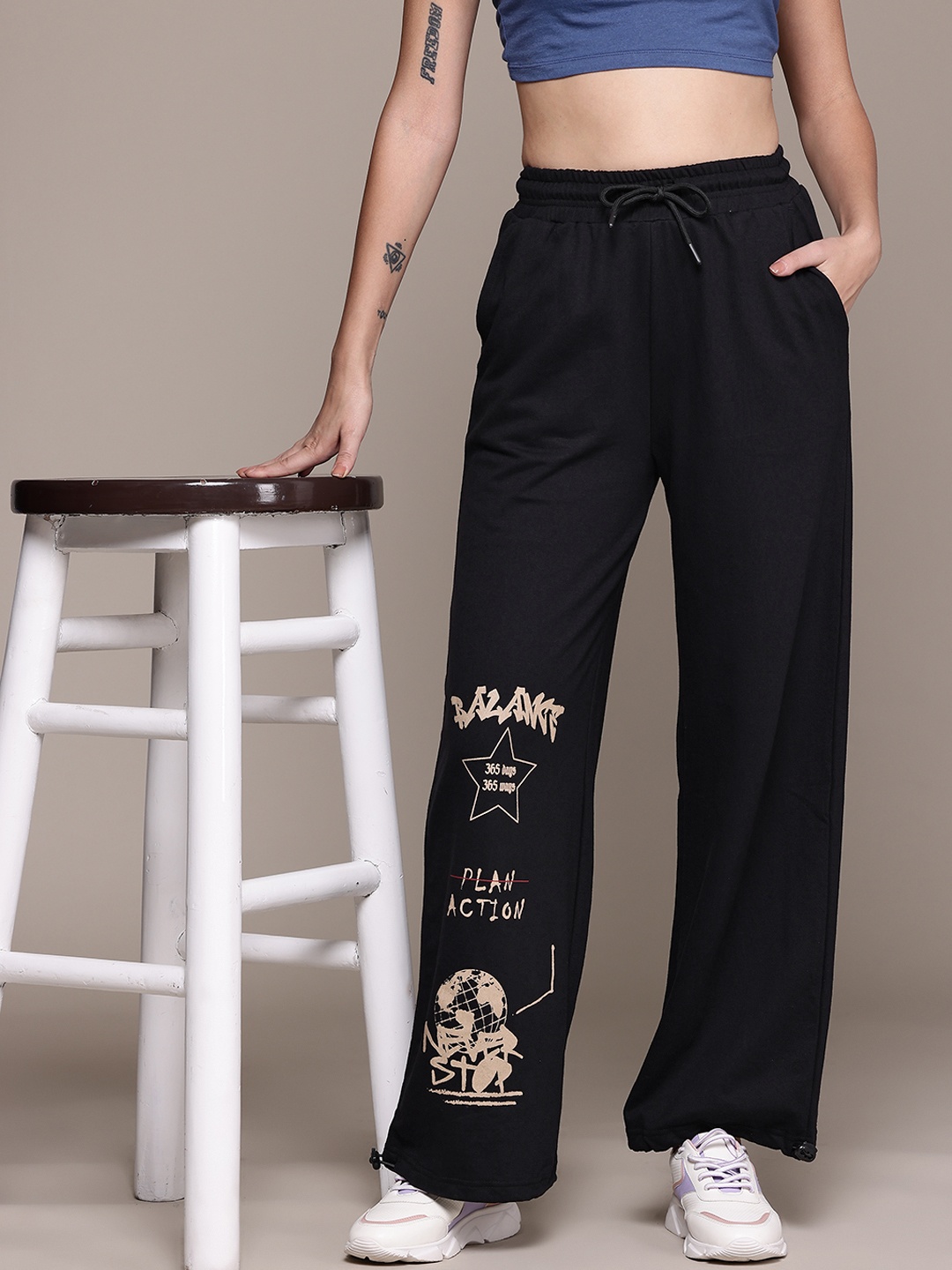 

The Roadster Lifestyle Co. Women Printed Flared Track Pants, Black