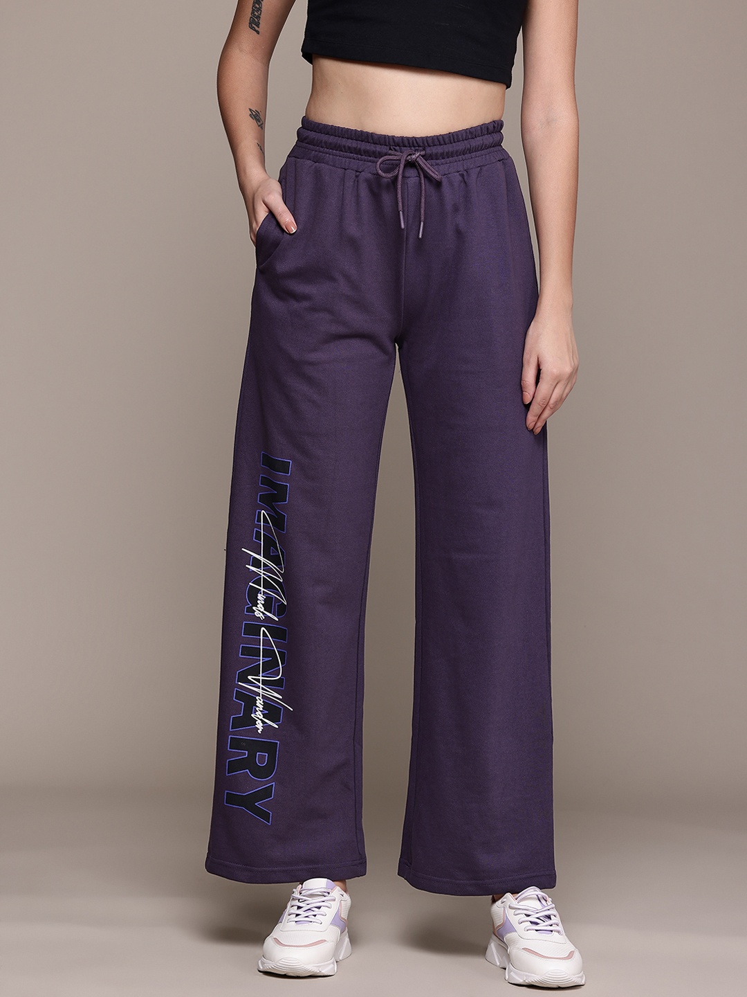 

The Roadster Lifestyle Co. Women Printed Detail Flared Track Pants, Purple