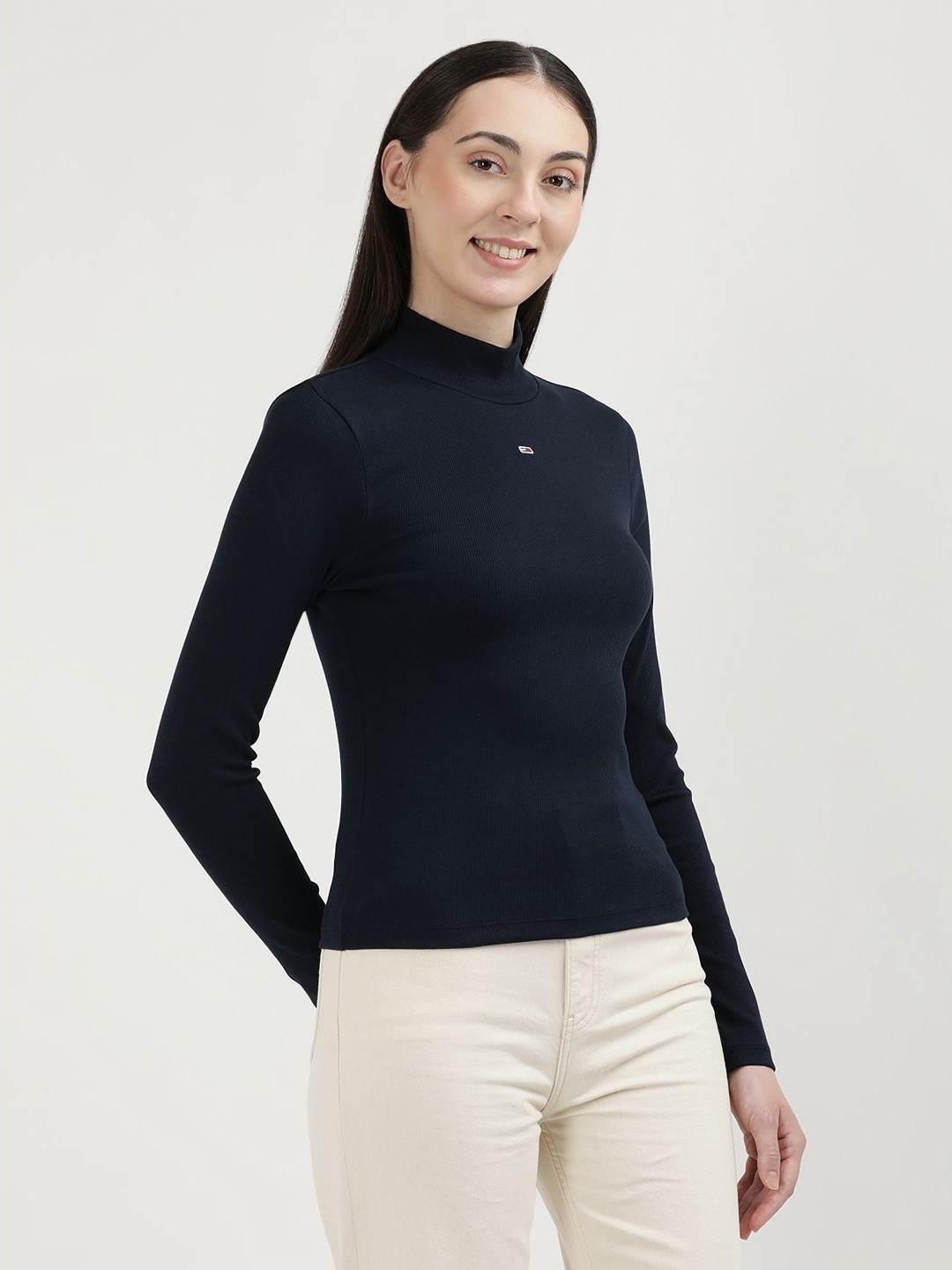 

Tommy Hilfiger Women Solid Brand Logo Printed High Neck Pockets Slim Fit T-shirt, Blue