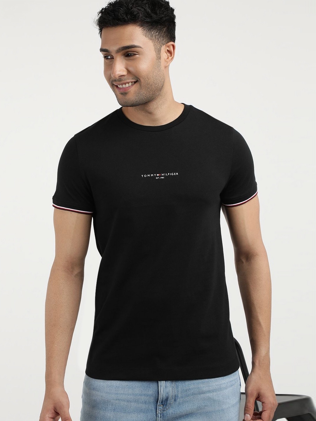 

Tommy Hilfiger Men Brand Logo Printed Regular Fit Round Neck T-shirt, Black