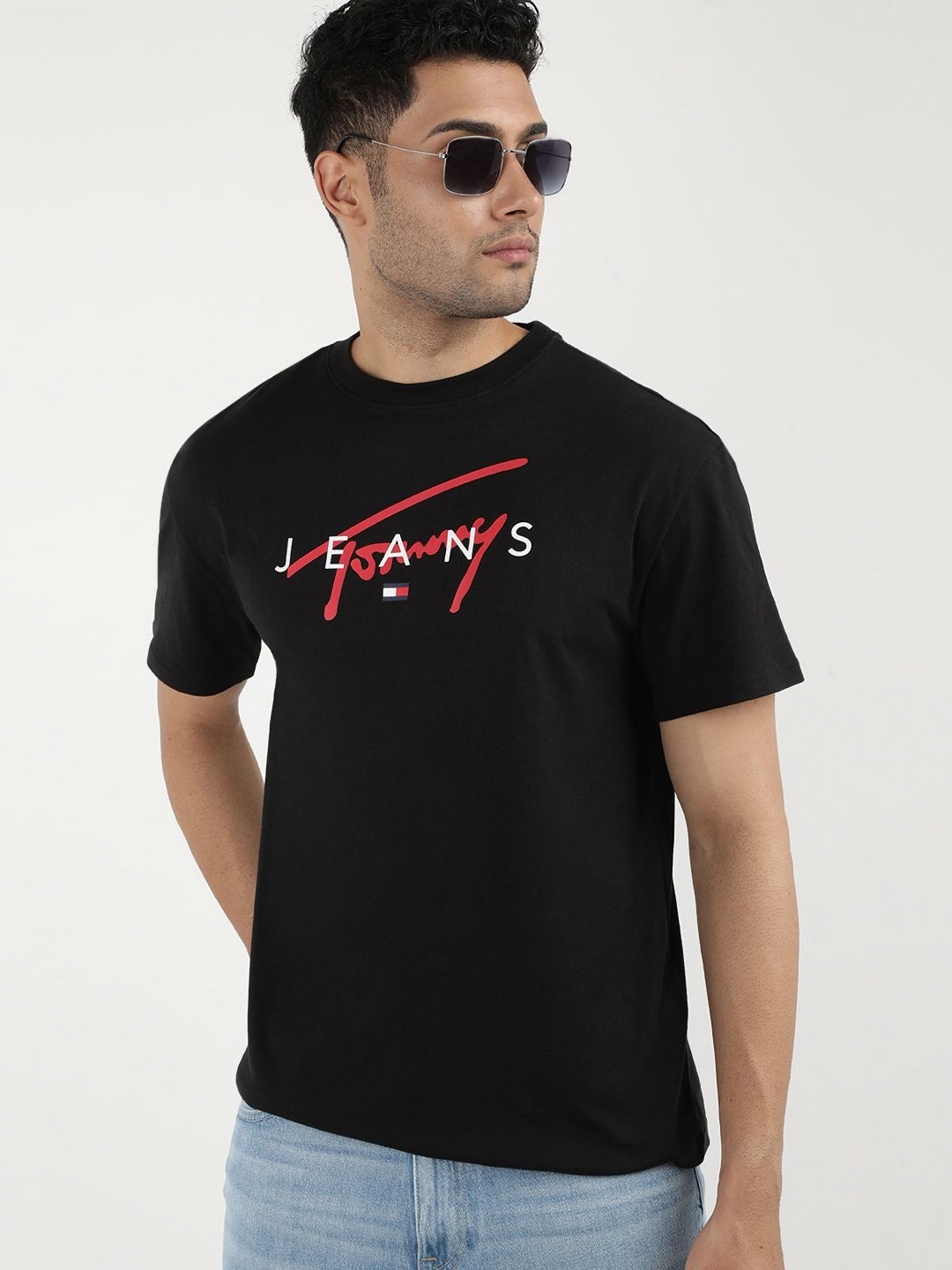

Tommy Hilfiger Men Typography Printed Round Neck Applique T-shirt, Black