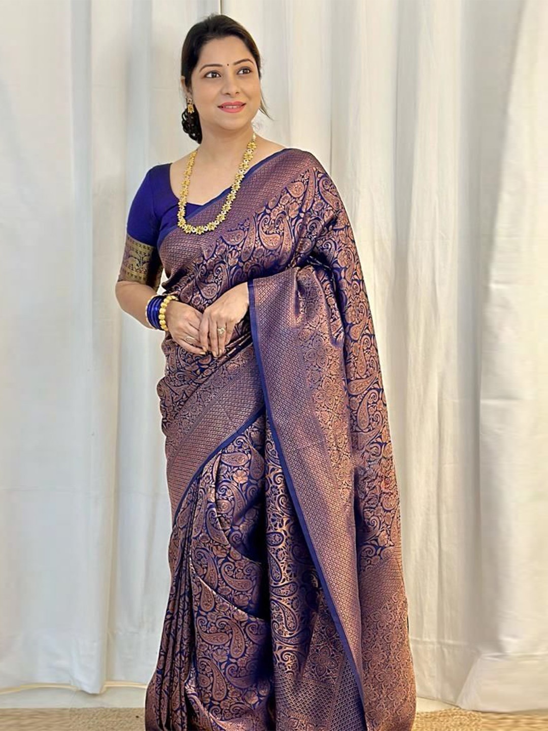 

revika Ethnic Motif Zari Woven Pure Silk Kanjeevaram Saree, Blue