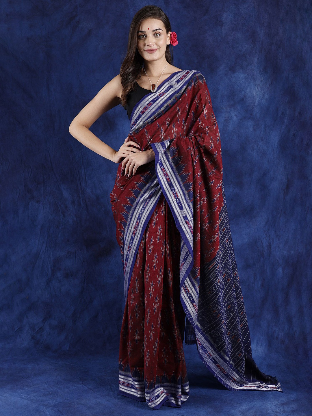 

Exotic India Zari Woven Pure Cotton Ikat Saree, Maroon