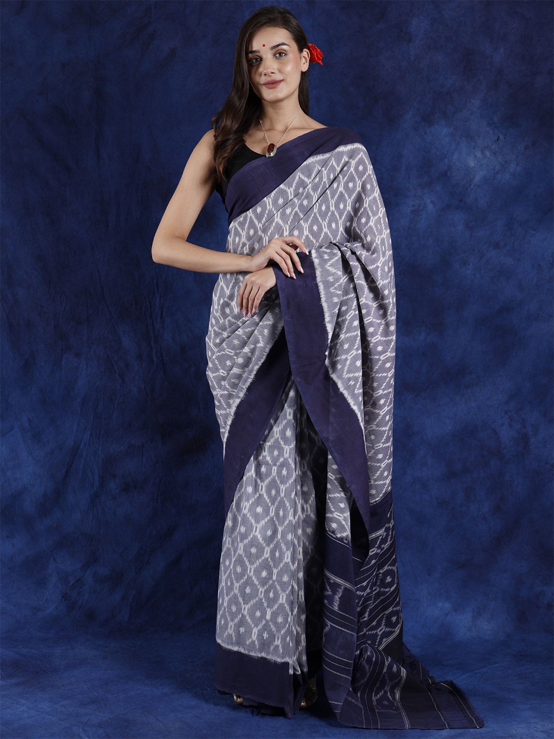 

Exotic India Silent Storm Pure Cotton Pochampally Saree with Evening Blue Ikat Border, Grey