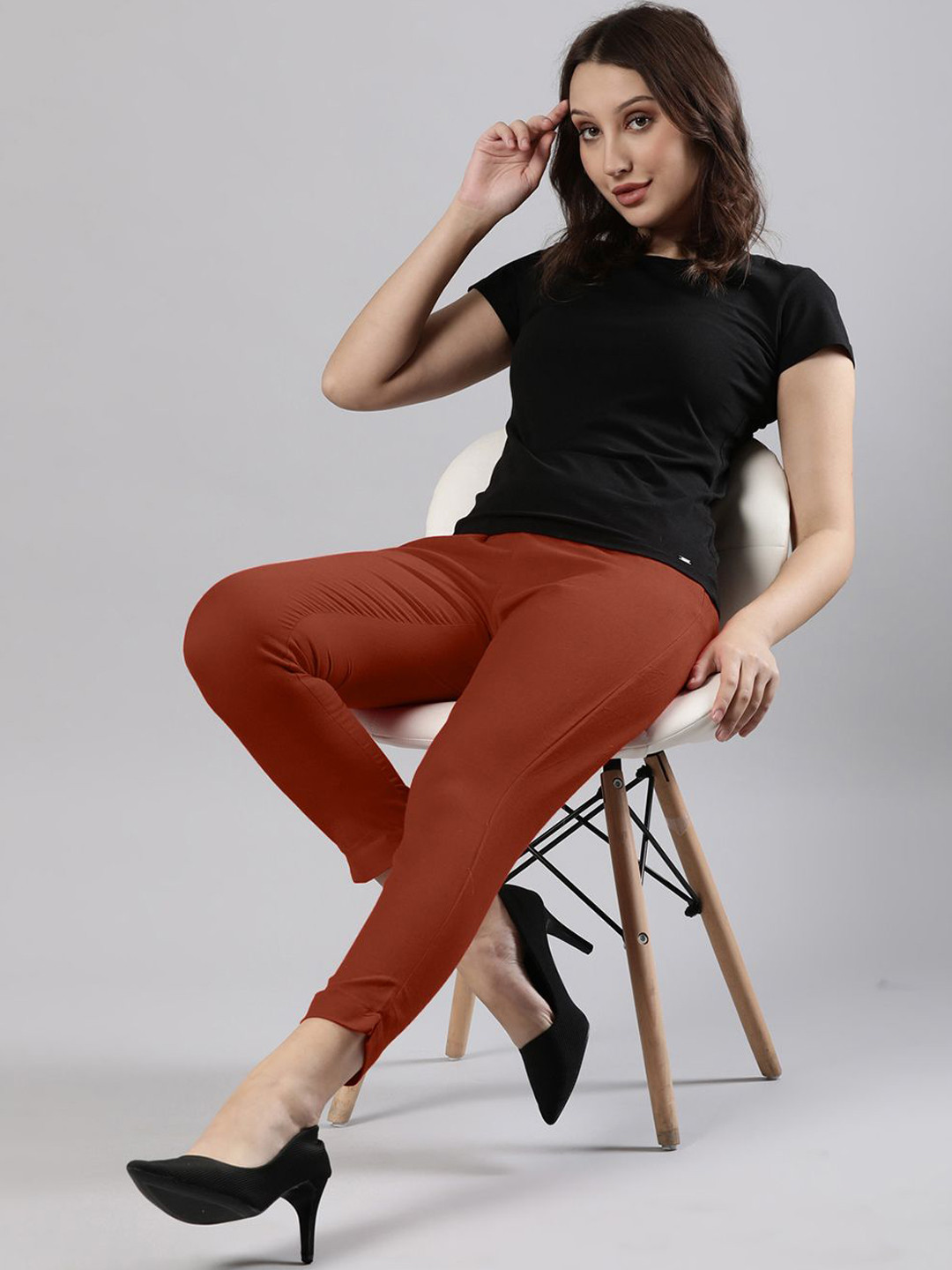 

Femmora Women Solid Regular Fit Comfort Mid-Rise Pleated Trousers, Rust