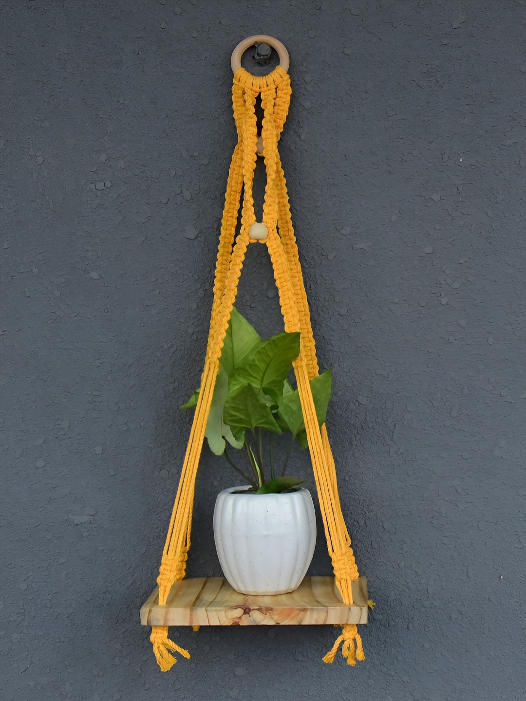 

Gathari Mustard & Beige Wooden Wall Shelf
