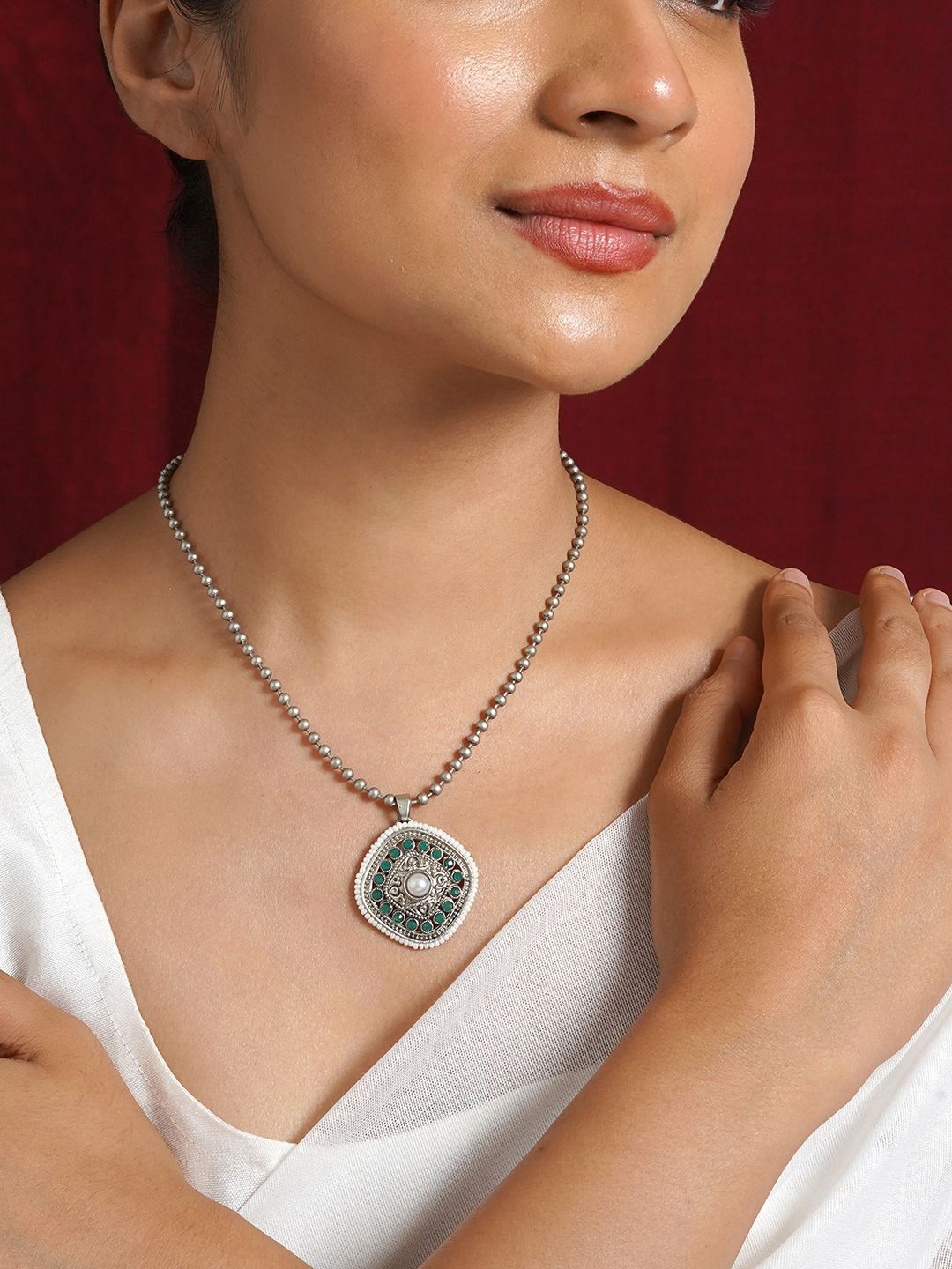 

TEEJH Ahilyabai Silver-Plated Stones Studded Contemporary Pendant with Chain