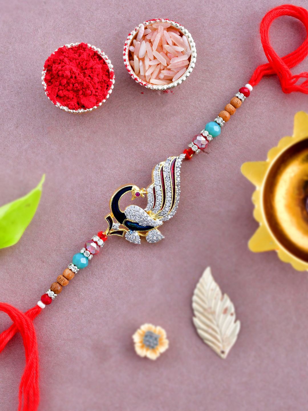 

Anouk White American Diamond-Studded & Beaded Rakhi With Roli Chawal & Greeting Card