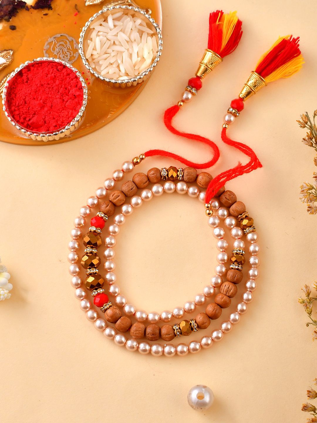 

Anouk Red Stone Studded & Beaded Bracelet Rakhi With Roli Chawal & Greeting Card, Brown