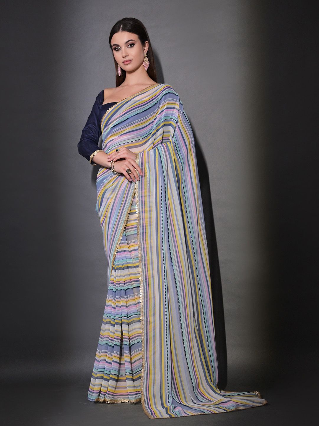 

Ishin Striped Pure Georgette Saree, Yellow