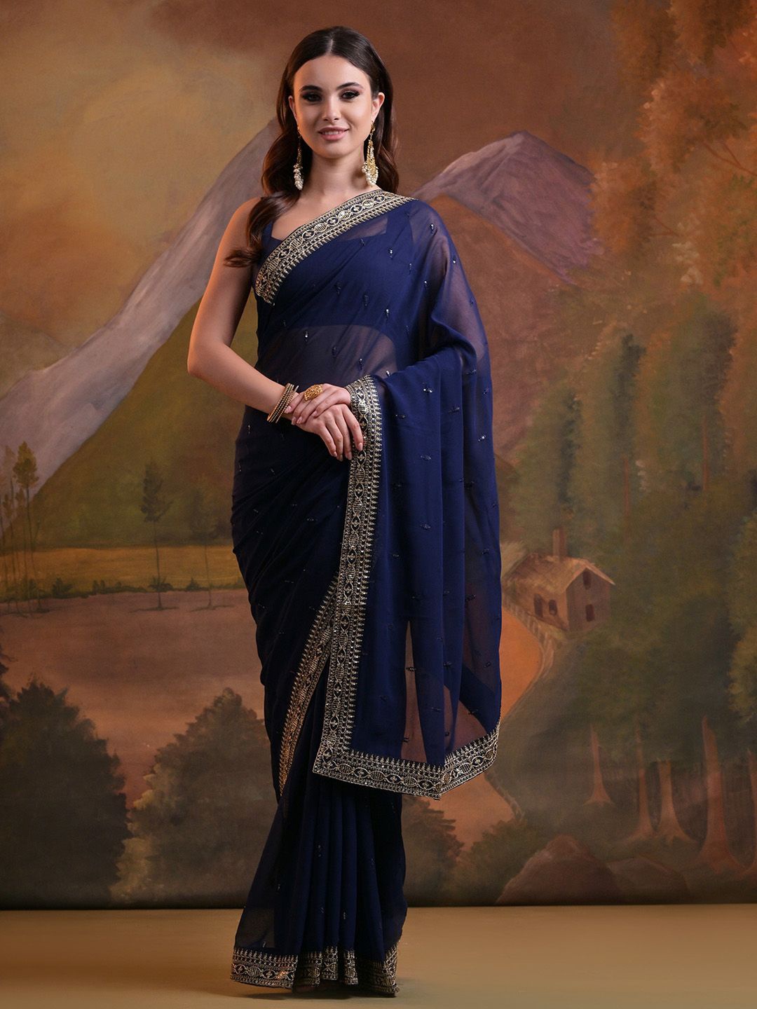 

Ishin Sequinned Pure Georgette Saree, Navy blue