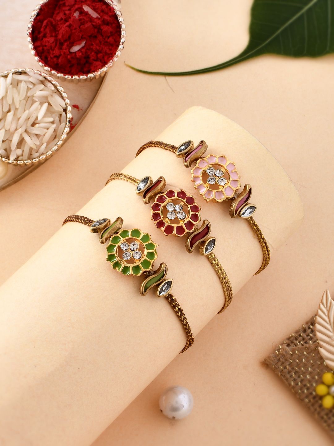 

Anouk Set Of 3 Red Kundan-Studded & Beaded Rakhi With Roli Rice & Greeting Card