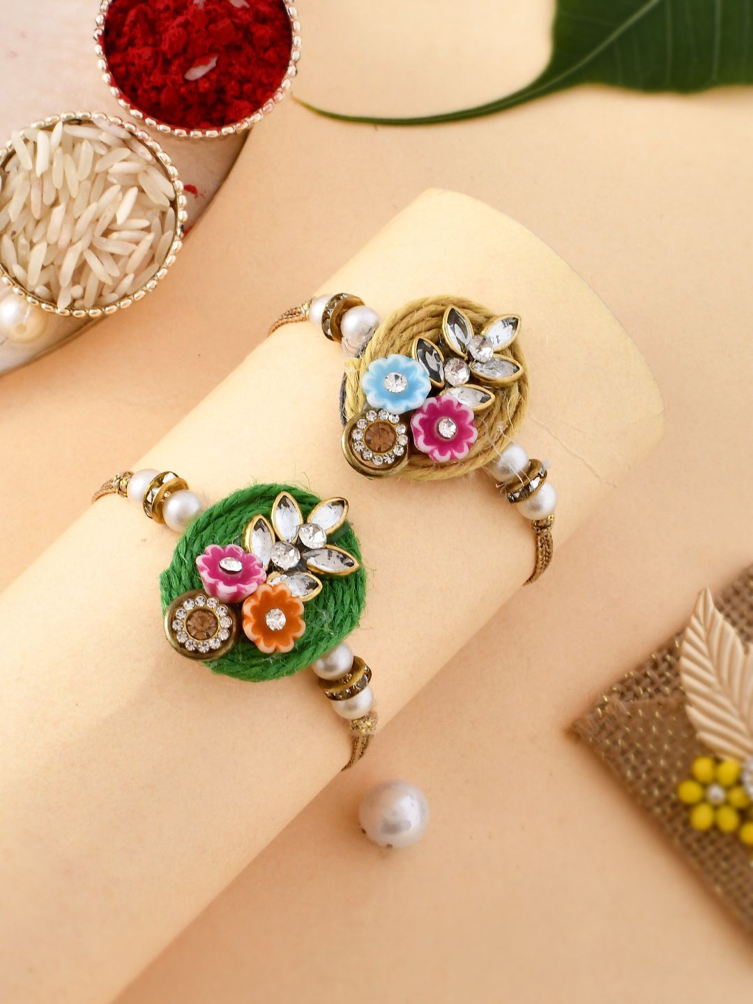 

Anouk Set Of 2 Green Beaded Rakhi With Roli Rice & Greeting Card