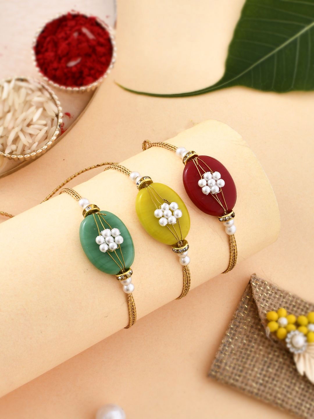 

Anouk Yellow Set Of 3 Pearl-Beaded Thread Rakhis With Roli Chawal