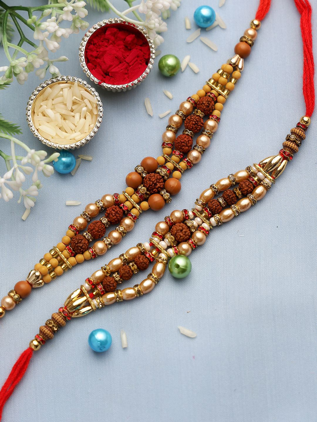 

Anouk Set Of 2 Brown Rudaraksh Beaded Rakhis Comes With Roli Rice & Greeting Card