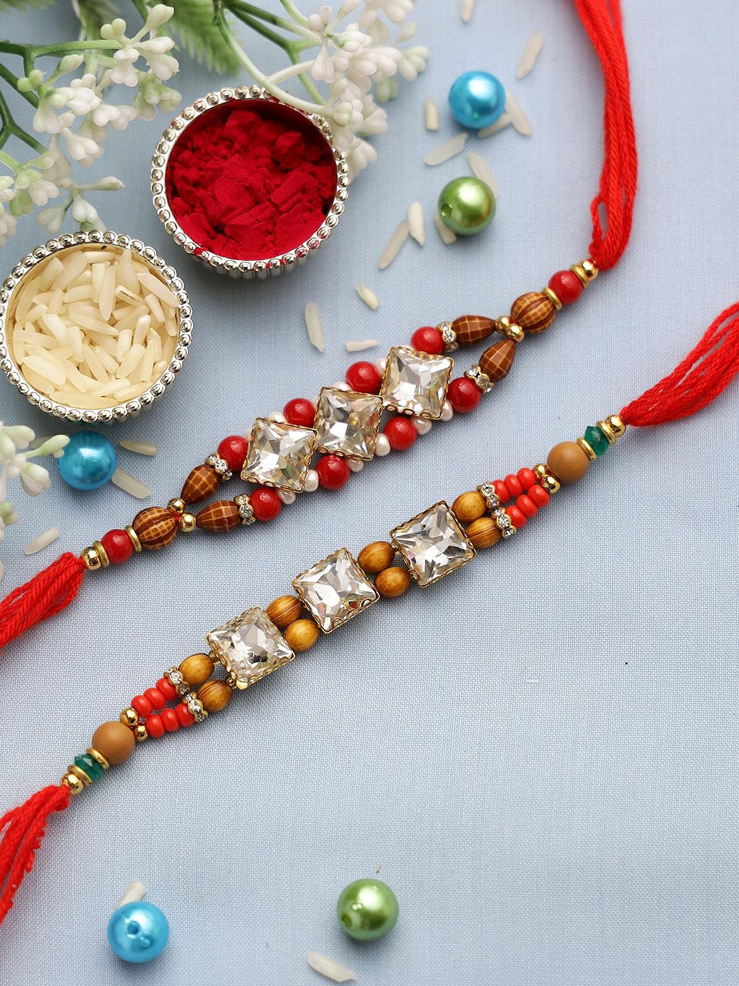 

Anouk Set Of 2 Red Beaded Rakhis With Roli Chawal & Greeting Card