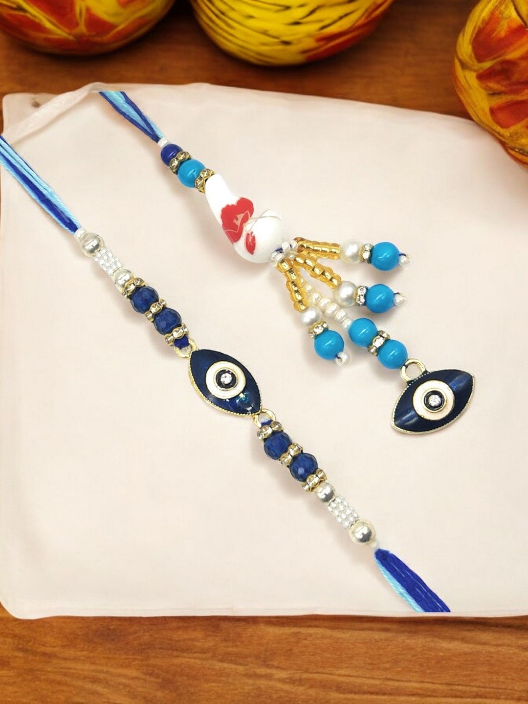 

ISHKAARA Set of 2 Beaded Evil Eye Thread & Lumba Rakhis, Blue