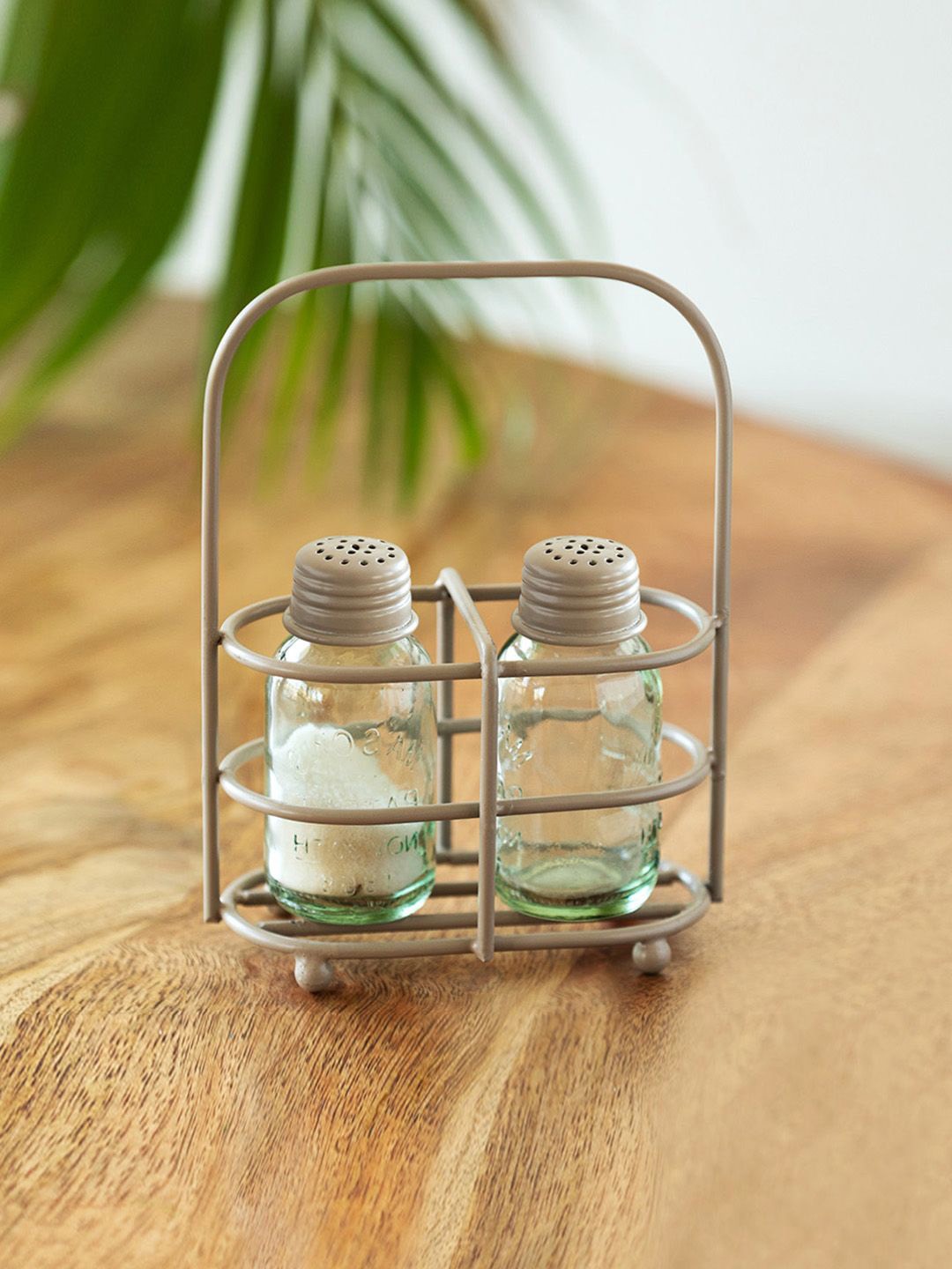 

ExclusiveLane Transparent & Beige 2 Pieces Glass Salt and Pepper Shaker-60ml