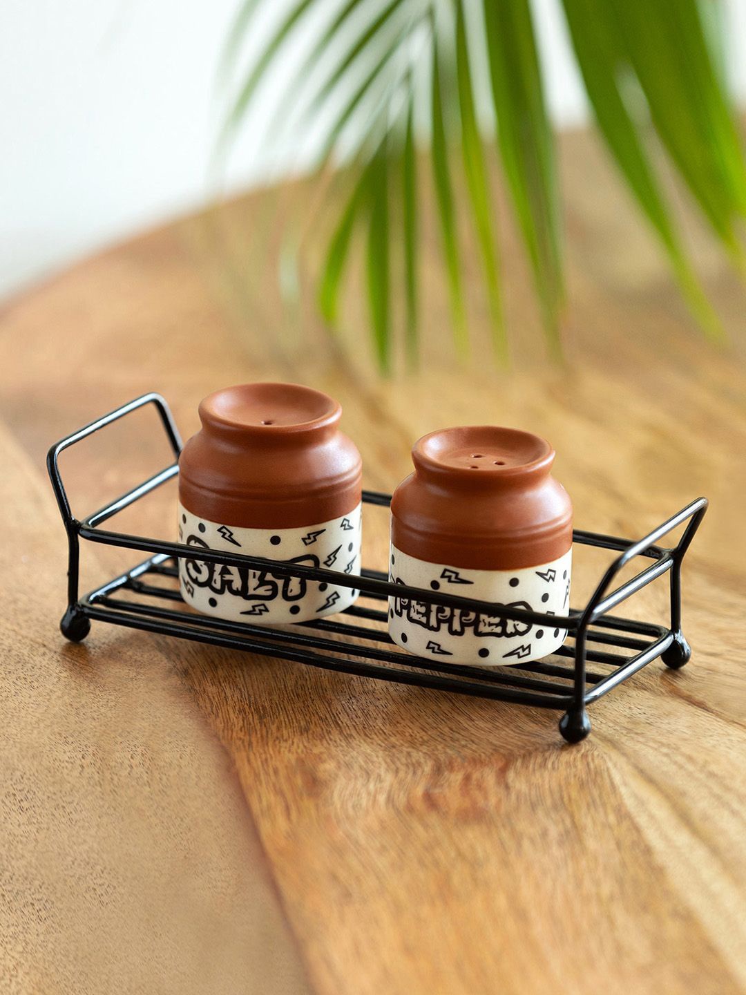 

ExclusiveLane Brown & White 2 Pieces Salt & Pepper Shakers