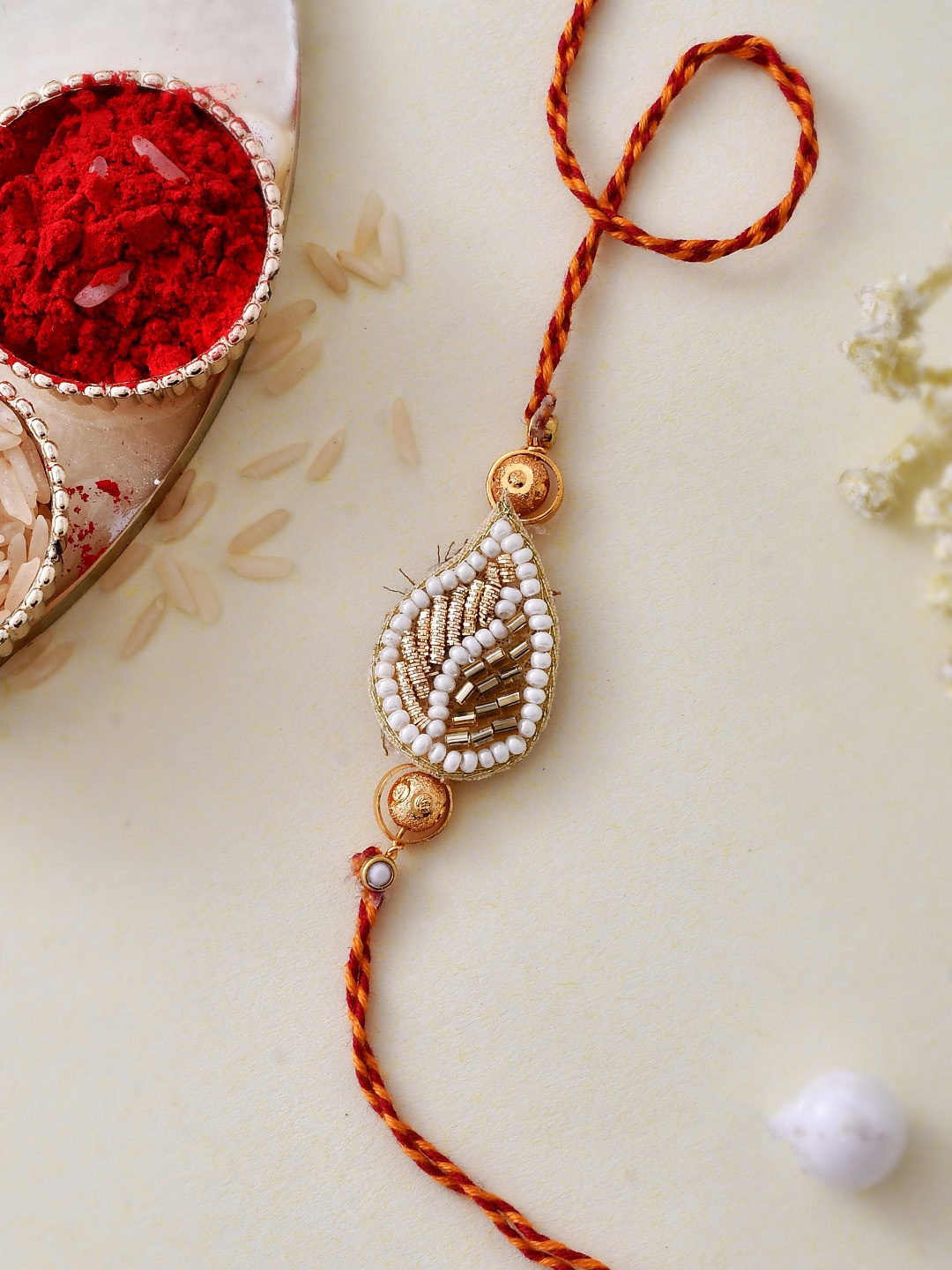 

House of Pataudi Pearl Beaded Thread Rakhi With Roli Chawal & Greeting Card, Red